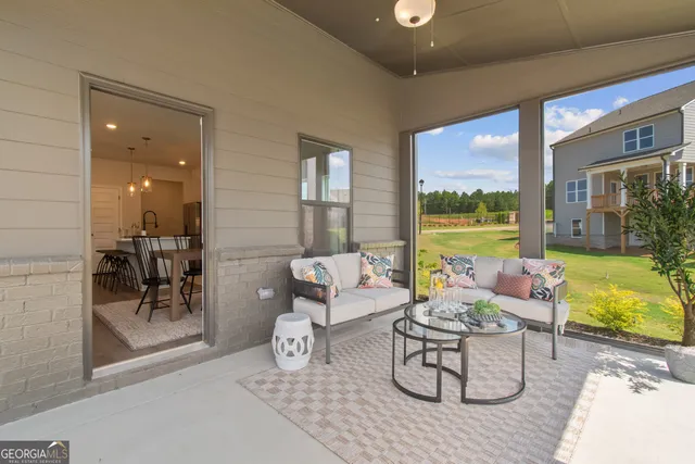 a kitchen with stainless steel appliances granite countertop a stove top oven a sink dishwasher and a refrigerator with wooden floor