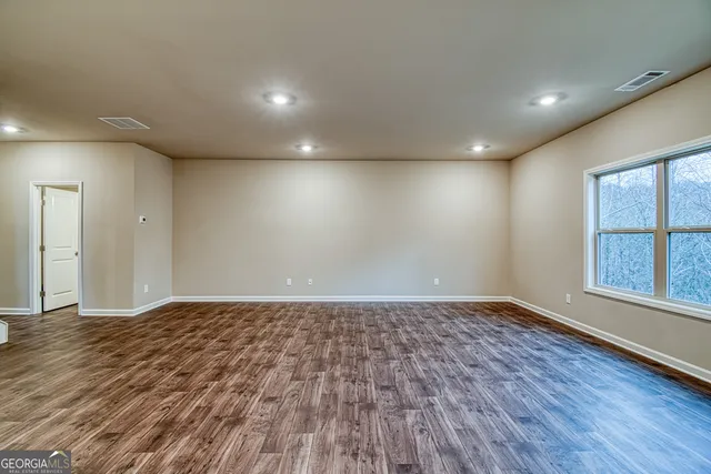 an empty room with windows