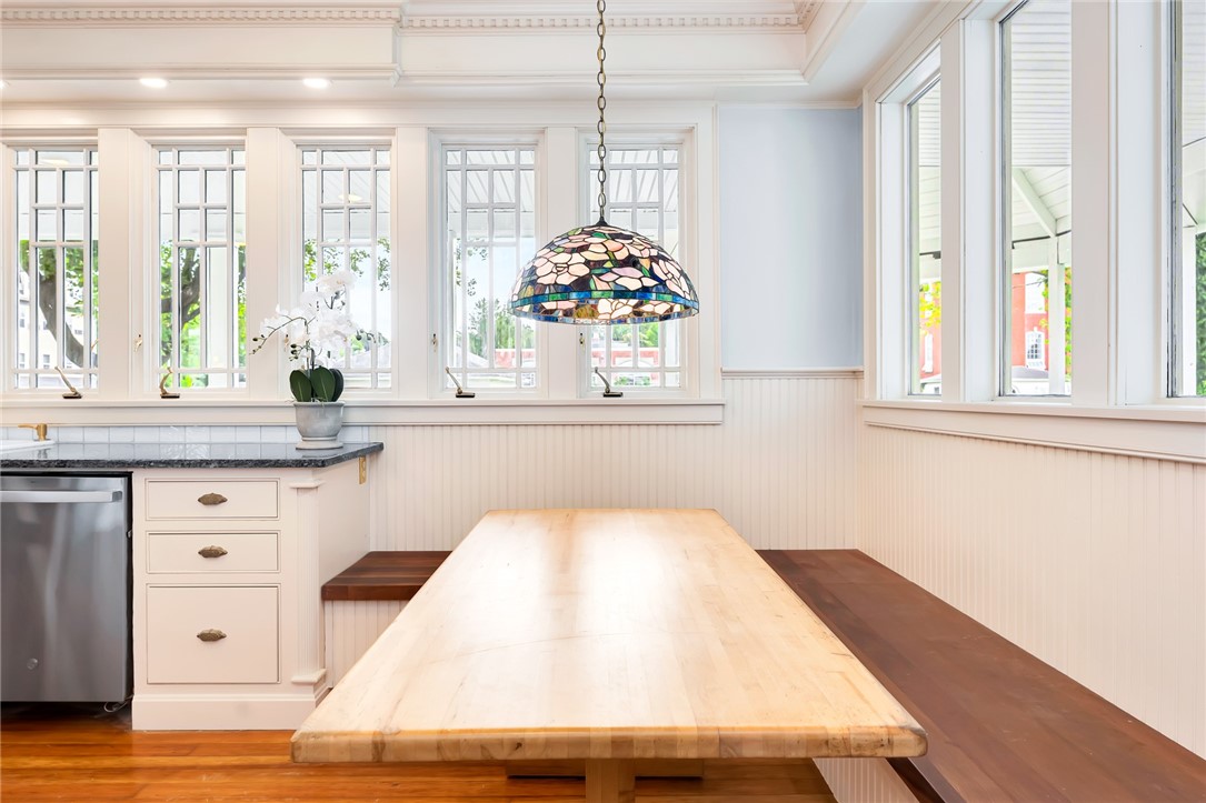 28 Elm Street Westerly, RI 02891 - Photo 22 of 48 A large and built in banquette allows for eating casual meals in the kitchen