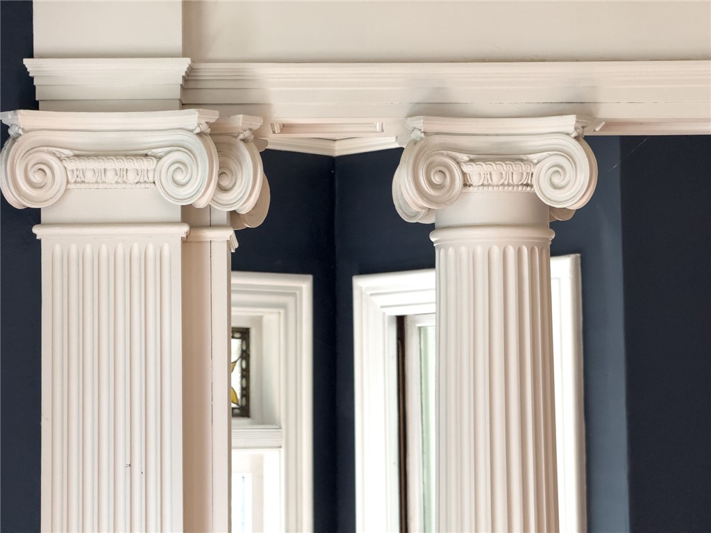 28 Elm Street Westerly, RI 02891 - Photo 7 of 48 Original hand carved Ionic columns grace the hall and living room!