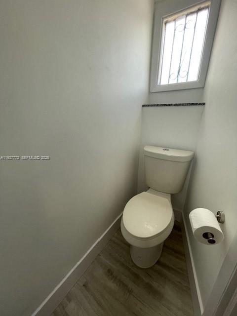 4357 West 11th Lane, Unit 55 Hialeah, FL 33012 - Photo 9 of 17 a bathroom with a toilet