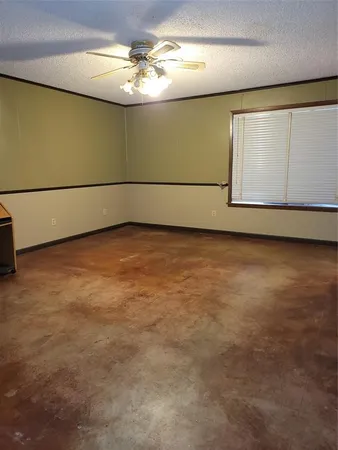 a view of a room with an empty space