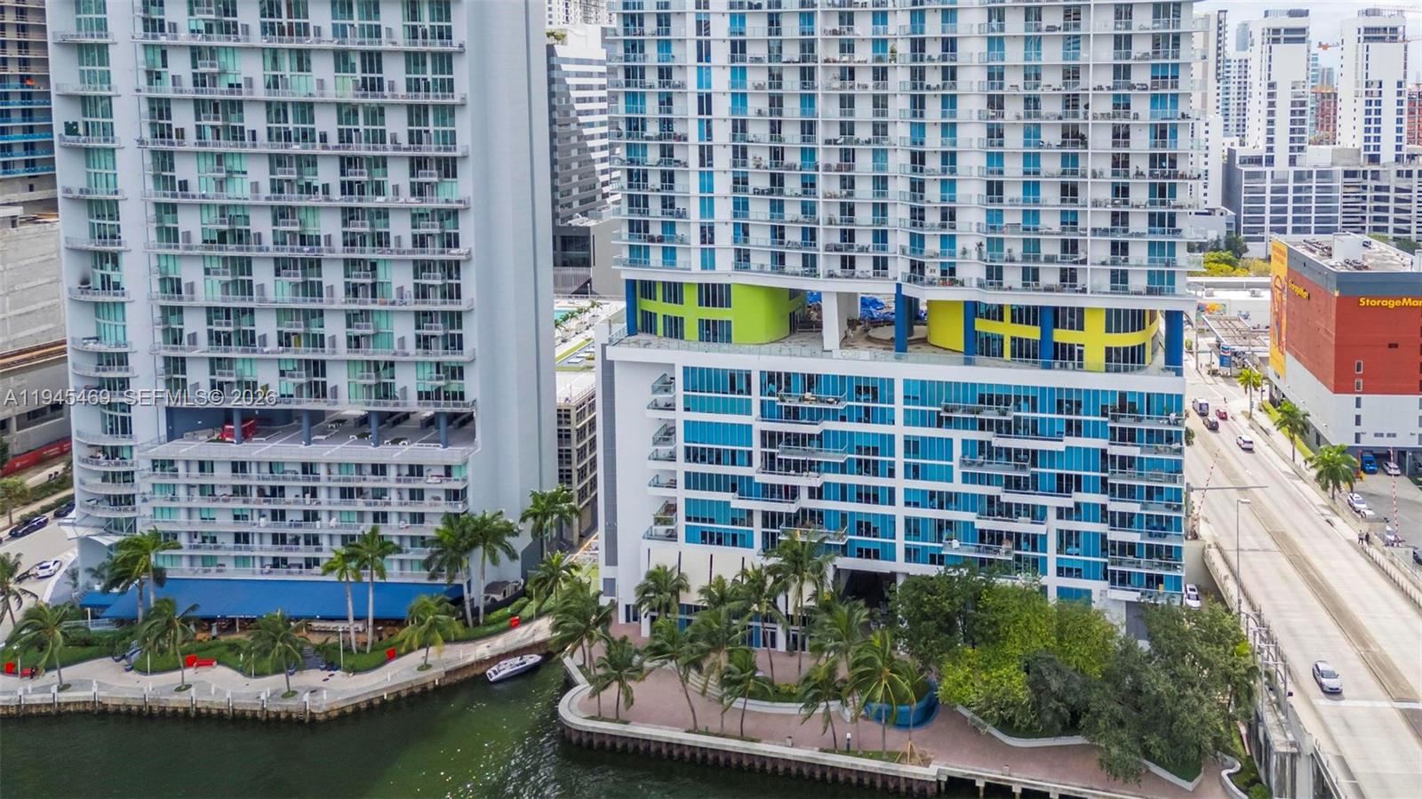 185 Southwest 7th Street, Unit 3508 Miami, FL 33130 - Photo 34 of 62 a front view of a building with swimming pool and outdoor seating