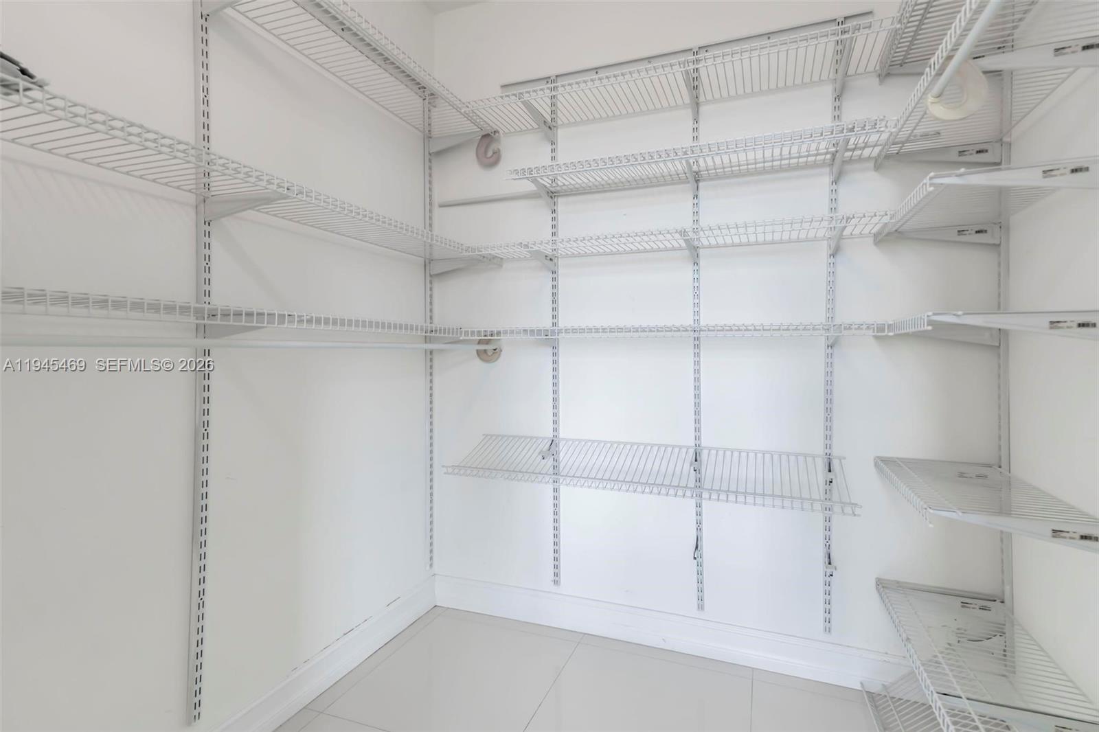 185 Southwest 7th Street, Unit 3508 Miami, FL 33130 - Photo 42 of 62 a view of a room with shelf