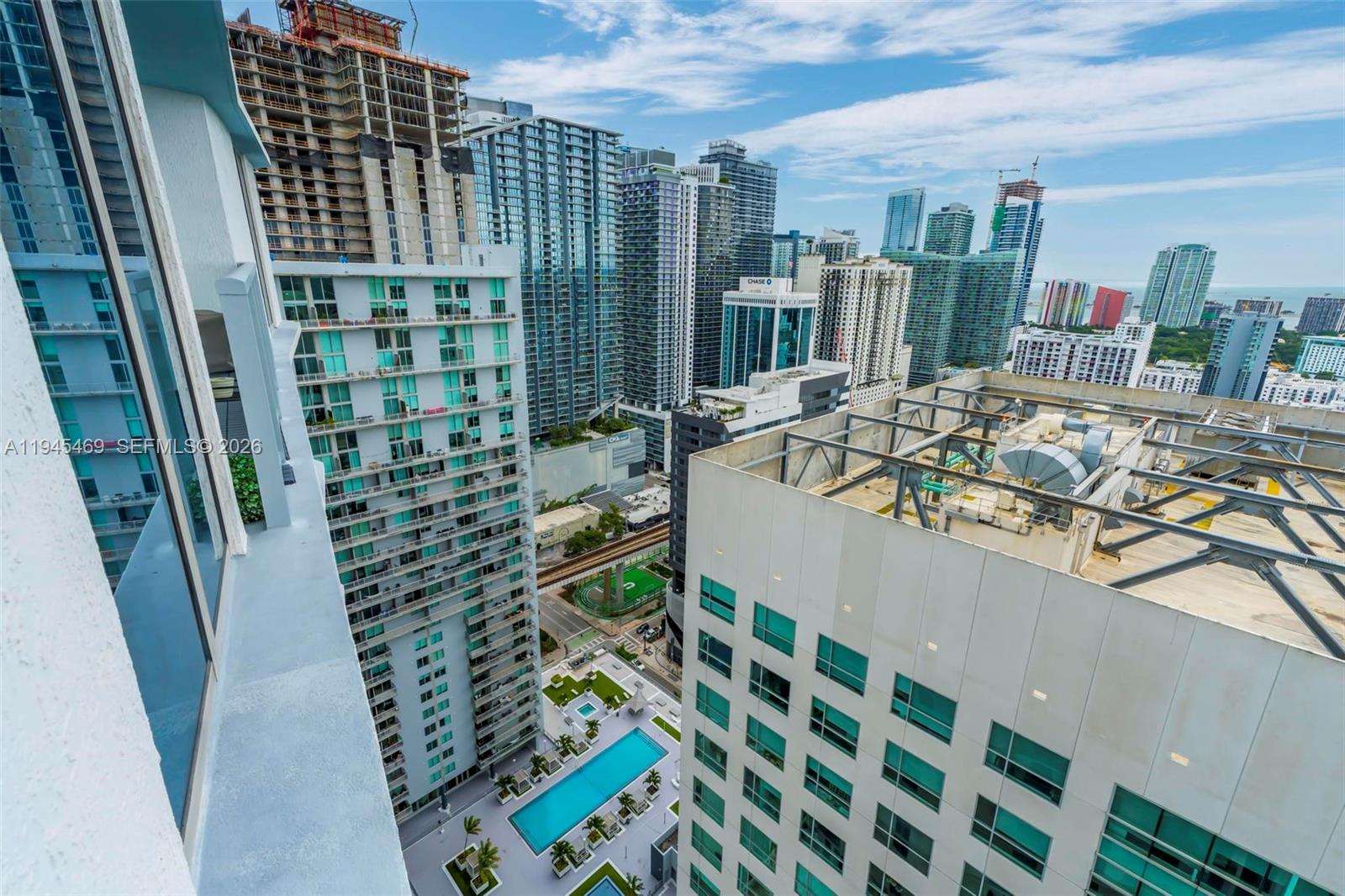 185 Southwest 7th Street, Unit 3508 Miami, FL 33130 - Photo 44 of 62 a view of swimming pool from a balcony