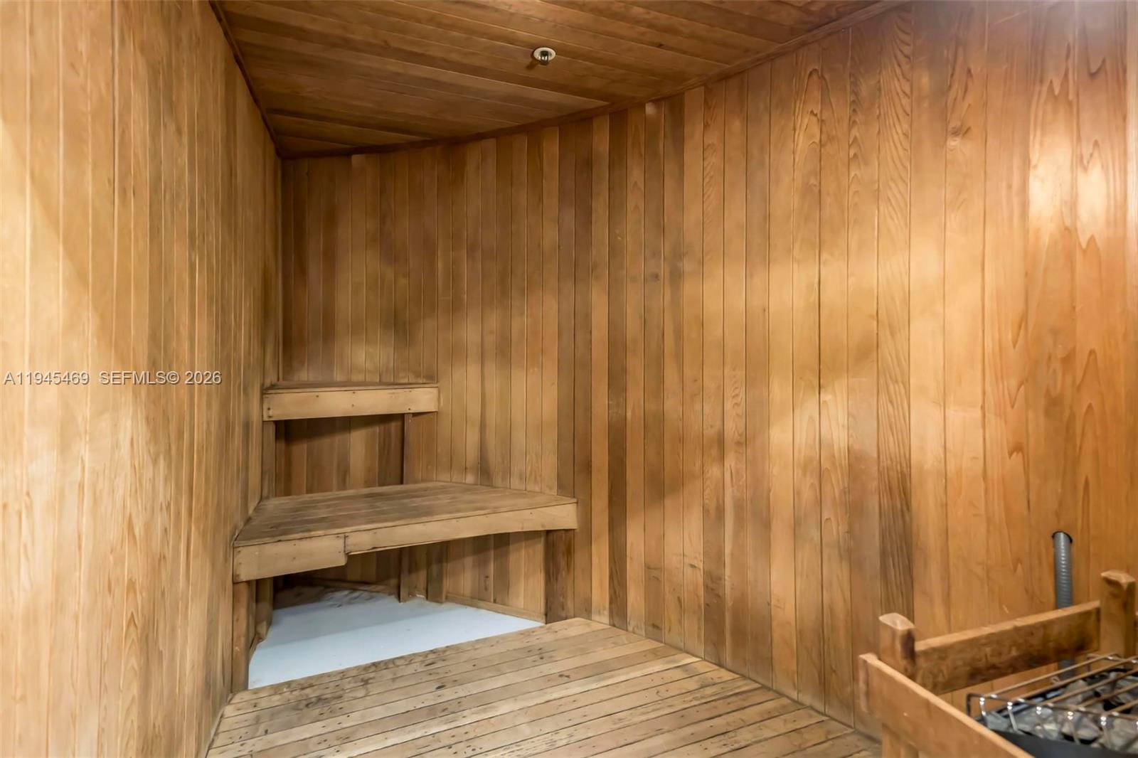 185 Southwest 7th Street, Unit 3508 Miami, FL 33130 - Photo 49 of 62 a room with wooden floor and furniture