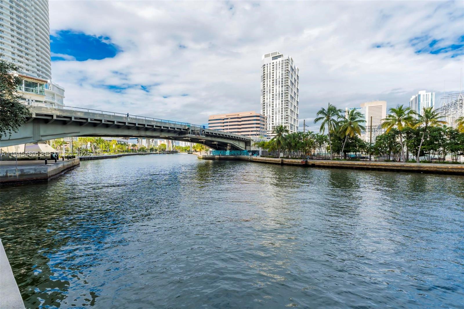 185 Southwest 7th Street, Unit 3508 Miami, FL 33130 - Photo 53 of 62 a view of swimming pool with outdoor seating and yard in back