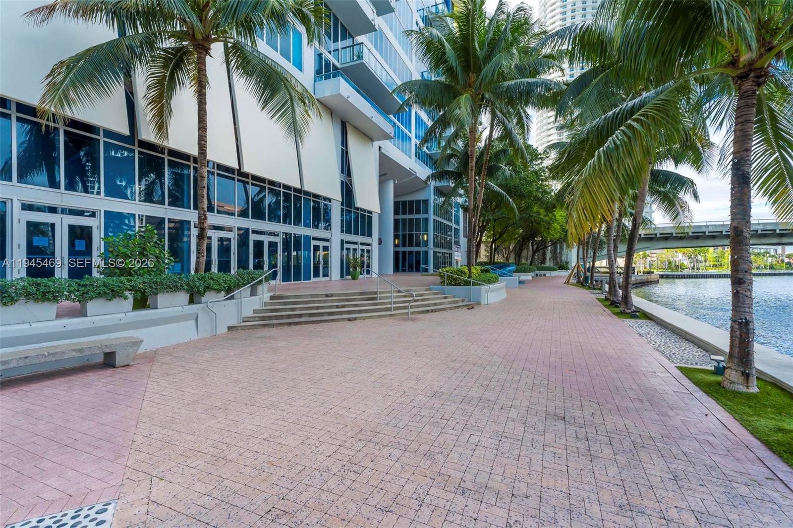 185 Southwest 7th Street, Unit 3508 Miami, FL 33130 - Photo 57 of 62 a view of a palm trees in a patio