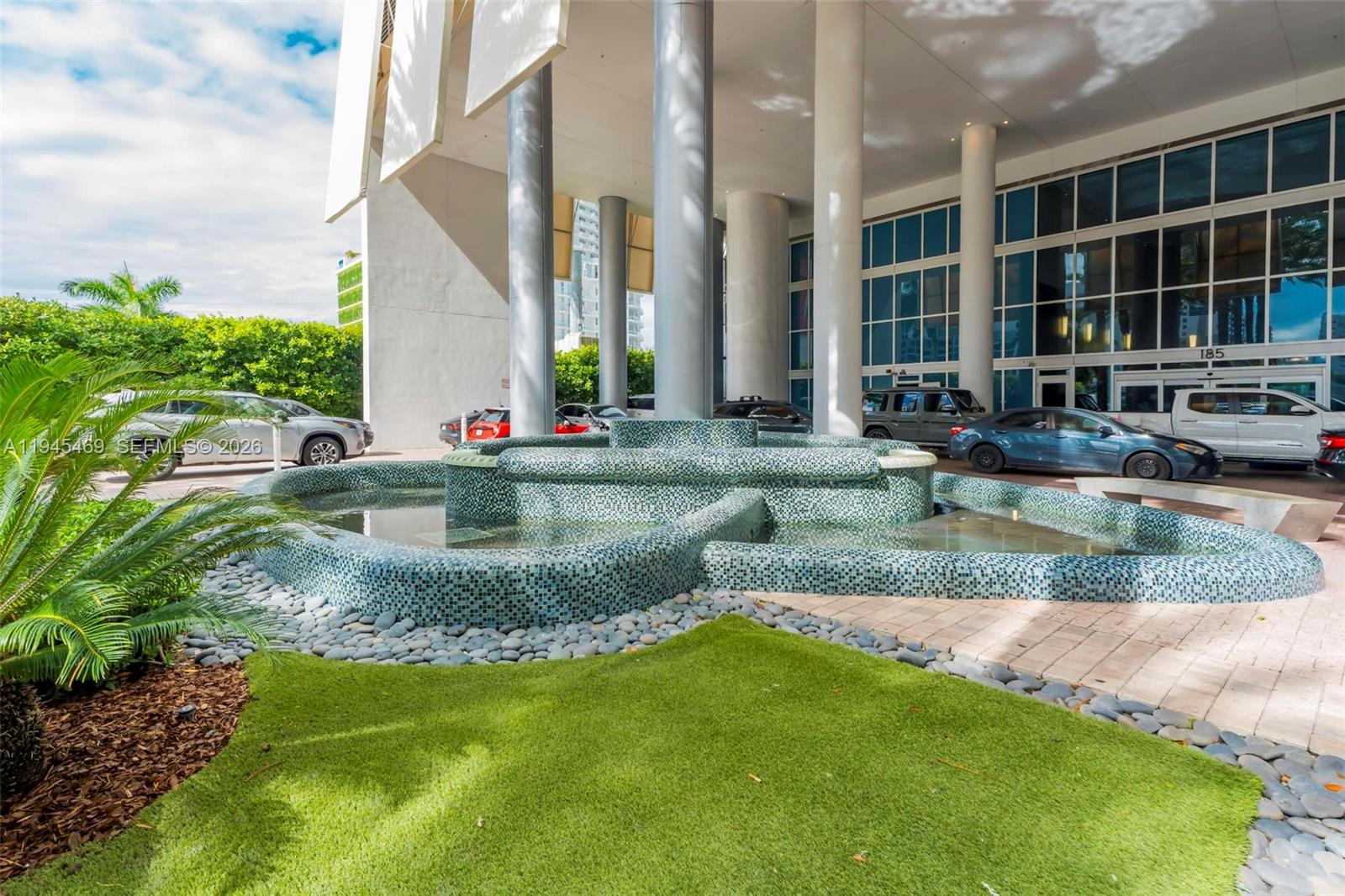 185 Southwest 7th Street, Unit 3508 Miami, FL 33130 - Photo 59 of 62 a view of a house with swimming pool and sitting area