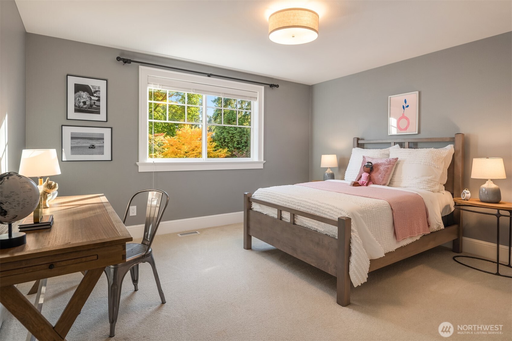 10475 Southeast 23rd Street Bellevue, WA 98004 - Photo 18 of 35 a bedroom with a bed chair and a window