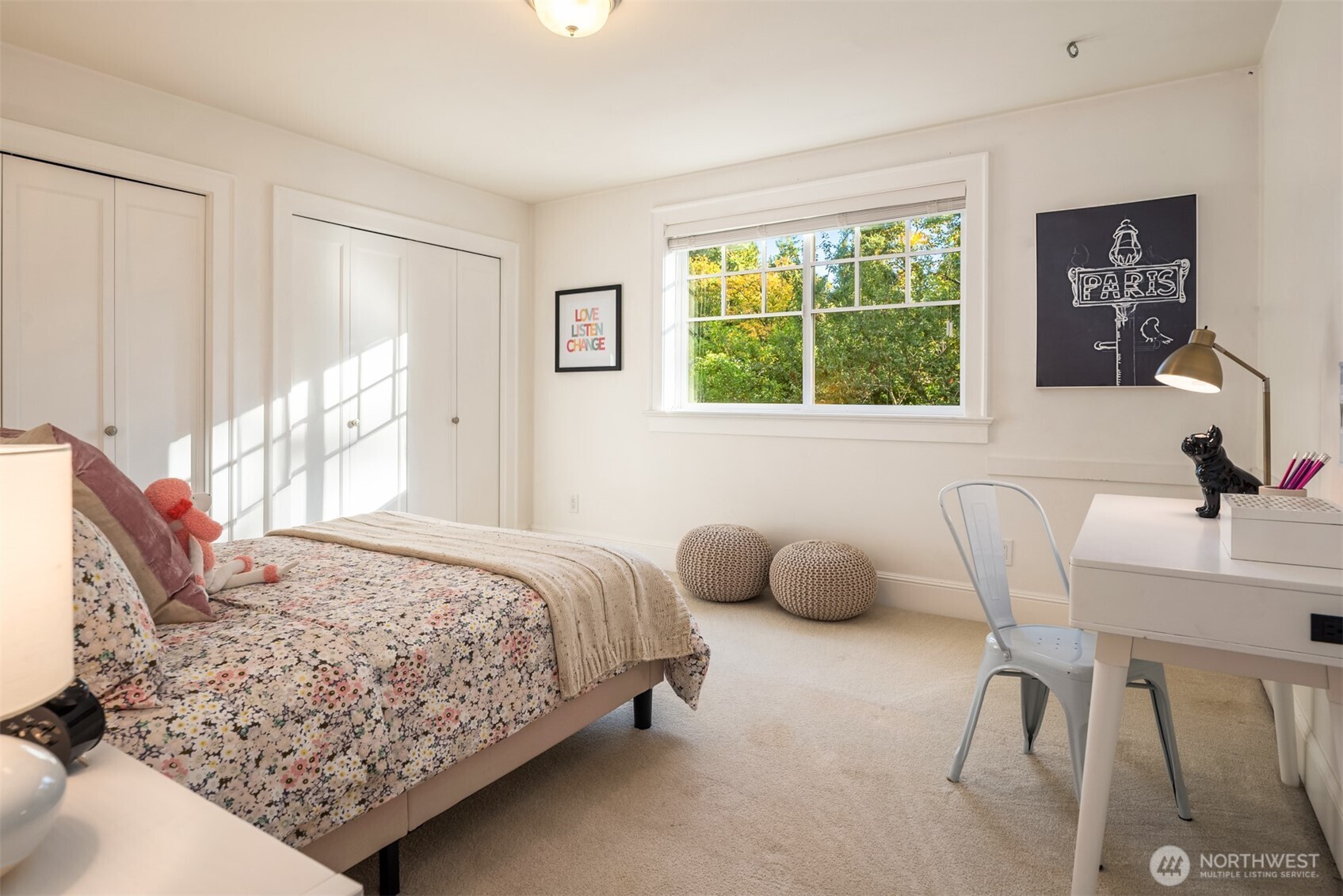 10475 Southeast 23rd Street Bellevue, WA 98004 - Photo 20 of 35 a bedroom with a bed and a window