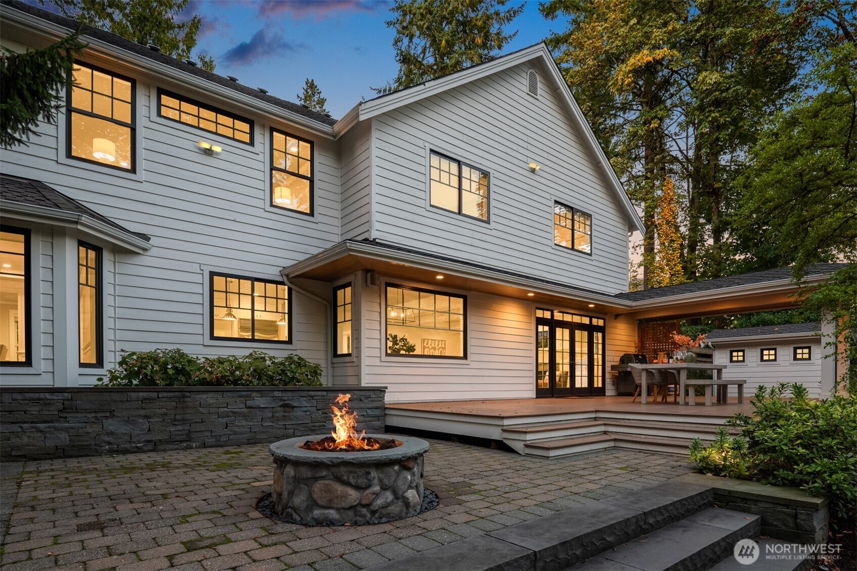 10475 Southeast 23rd Street Bellevue, WA 98004 - Photo 31 of 35 a front view of a house with a yard