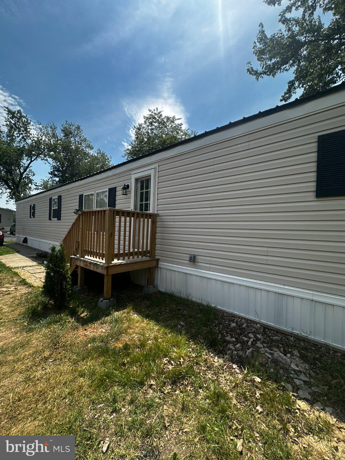 31777 Siham Road Lewes, DE 19958 - Photo 45 of 46 Charming mobile home with welcoming porch.