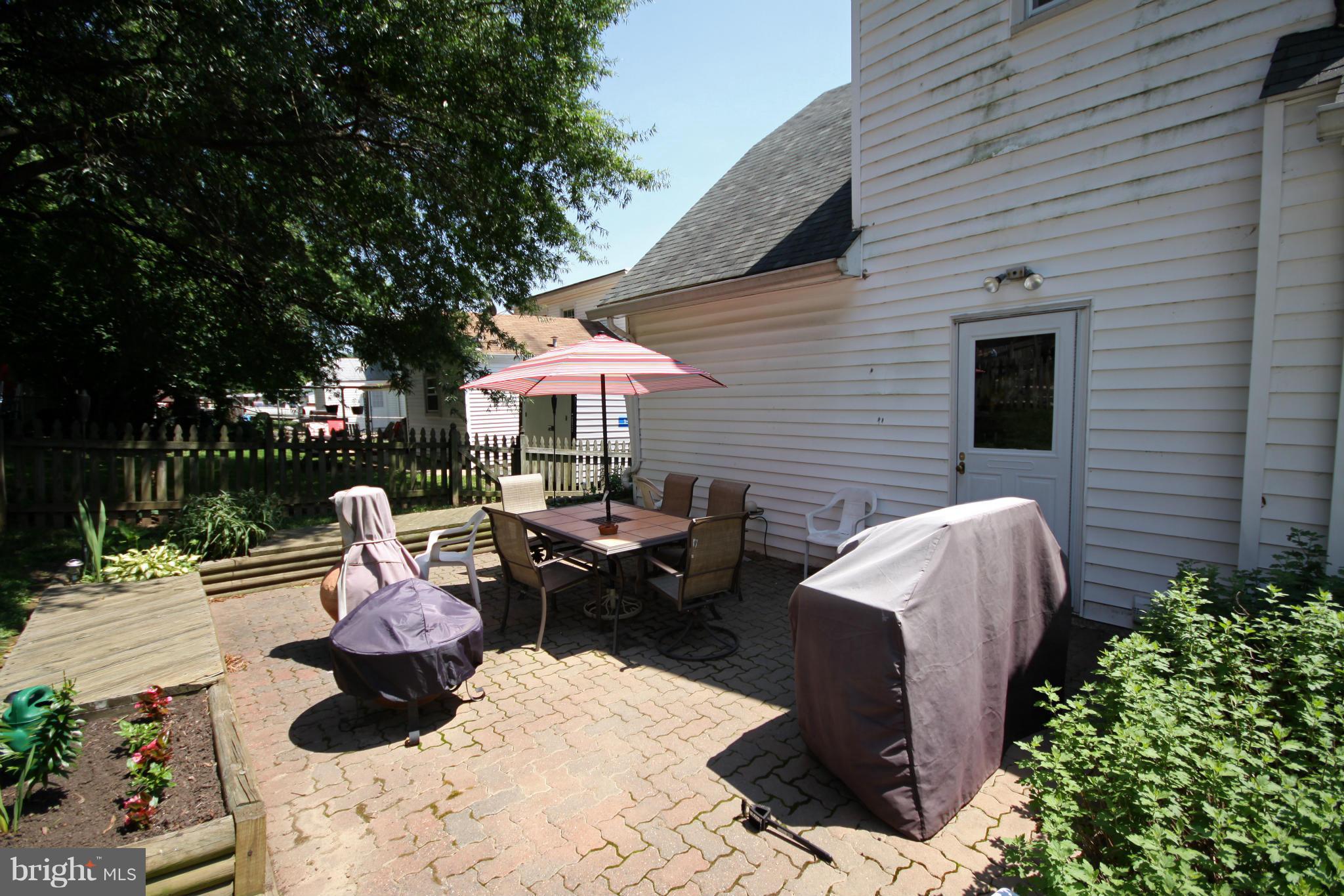 364 Nicholson Road Baltimore, MD 21221 - Photo 19 of 30 a view of backyard with outdoor seating and plants