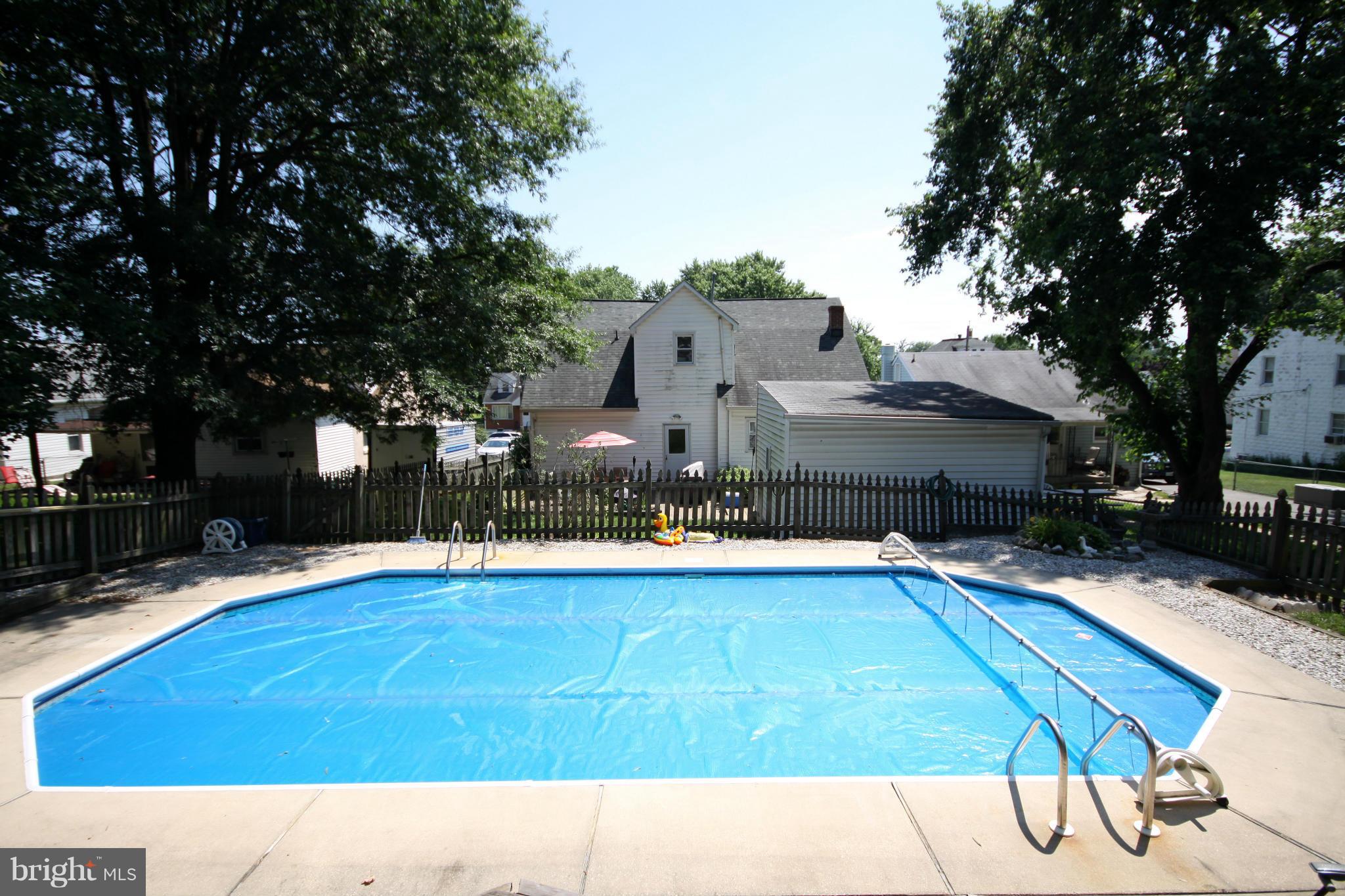 364 Nicholson Road Baltimore, MD 21221 - Photo 26 of 30 a swimming pool with outdoor seating and yard