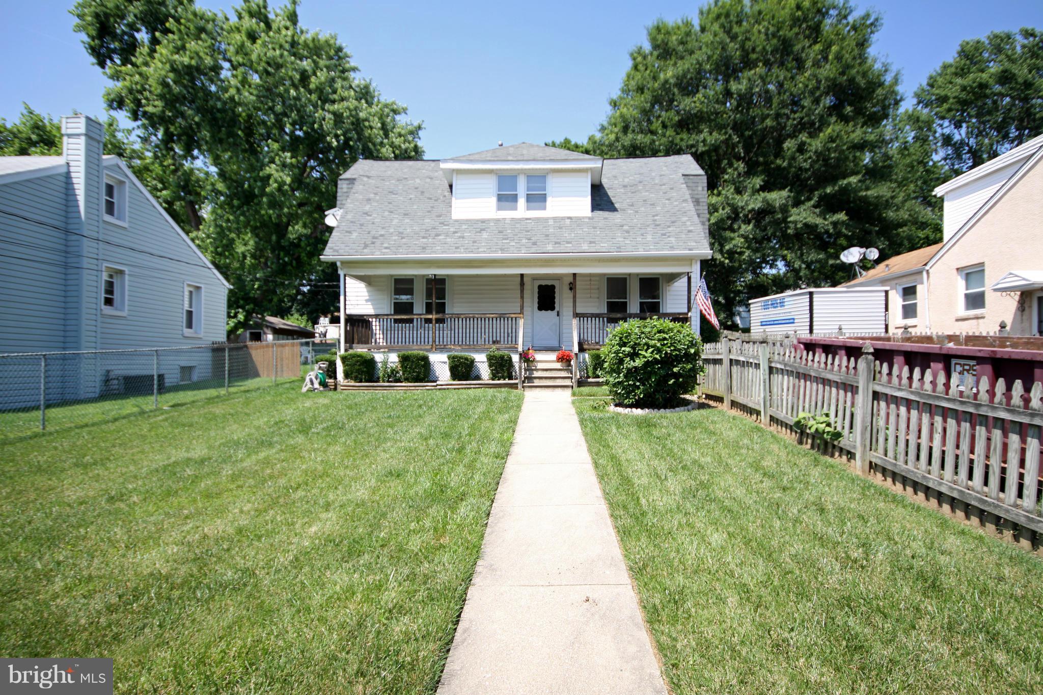 364 Nicholson Road Baltimore, MD 21221 - Photo 28 of 30 a front view of house with yard and green space