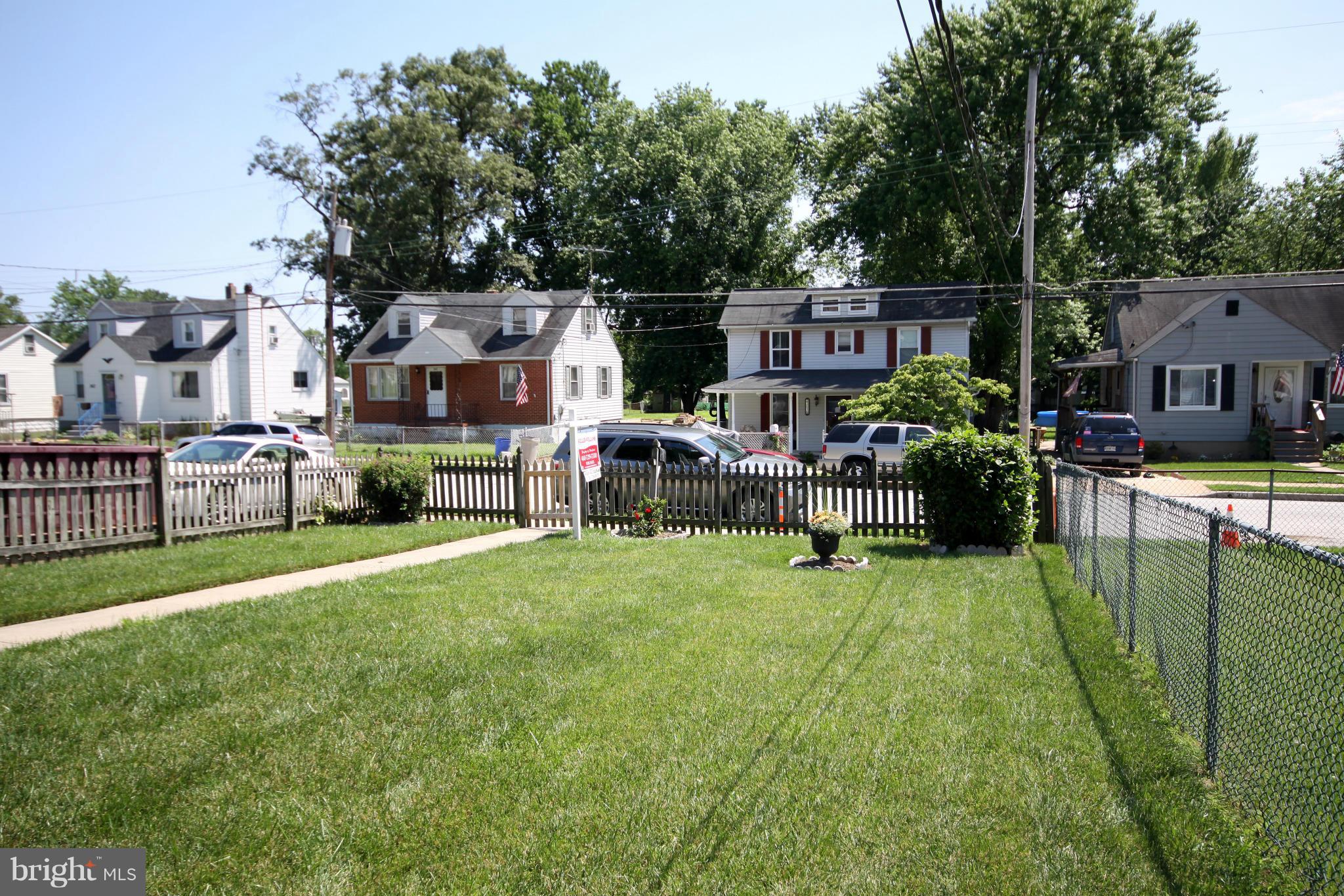 364 Nicholson Road Baltimore, MD 21221 - Photo 30 of 30 a backyard of a house with barbeque oven and outdoor seating