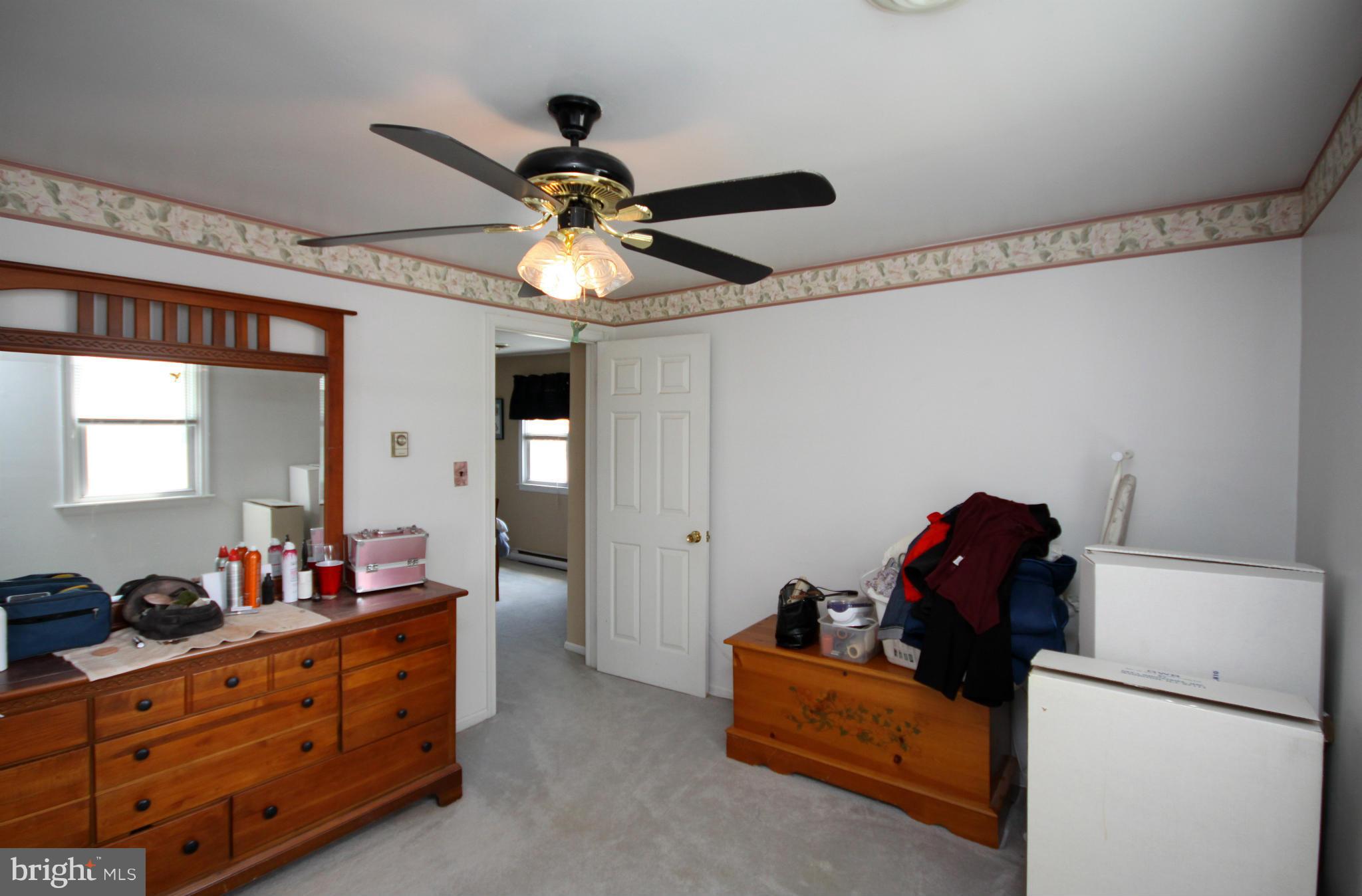 364 Nicholson Road Baltimore, MD 21221 - Photo 10 of 30 a living room with furniture and a flat screen tv