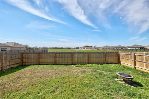 a view of a backyard with a tub