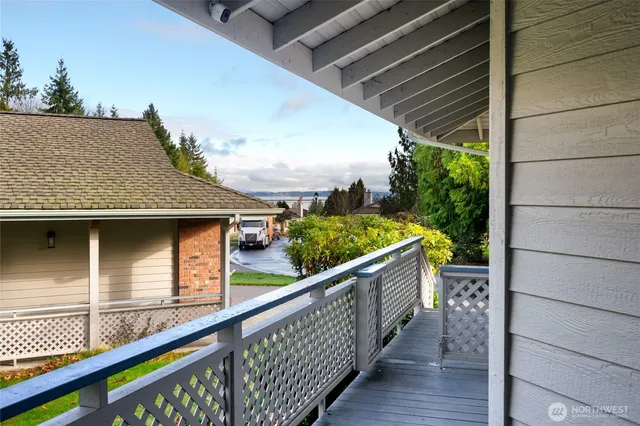 a view of balcony with small garden