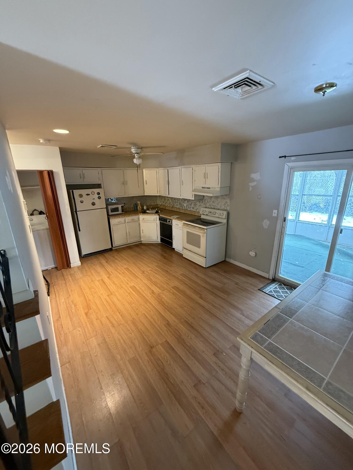 7 Sovereign Road Barnegat, NJ 08005 - Photo 3 of 7 a spacious bathroom with a sink and a mirror