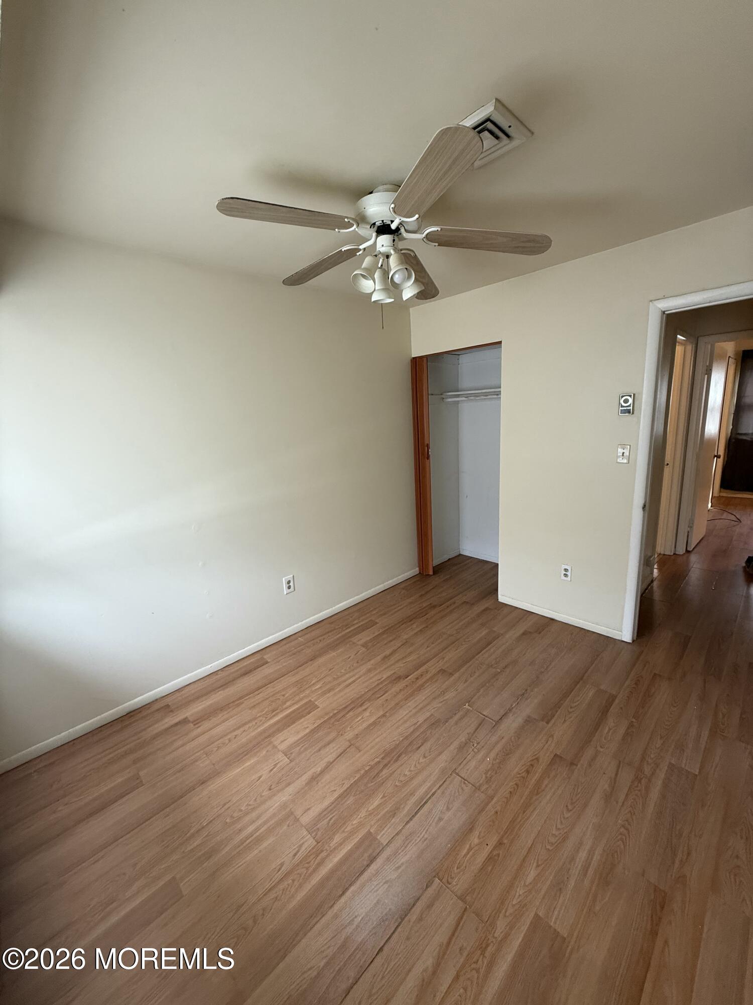 7 Sovereign Road Barnegat, NJ 08005 - Photo 6 of 7 wooden floor in an empty room