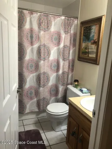 a view of a bathroom with a sink and a toilet