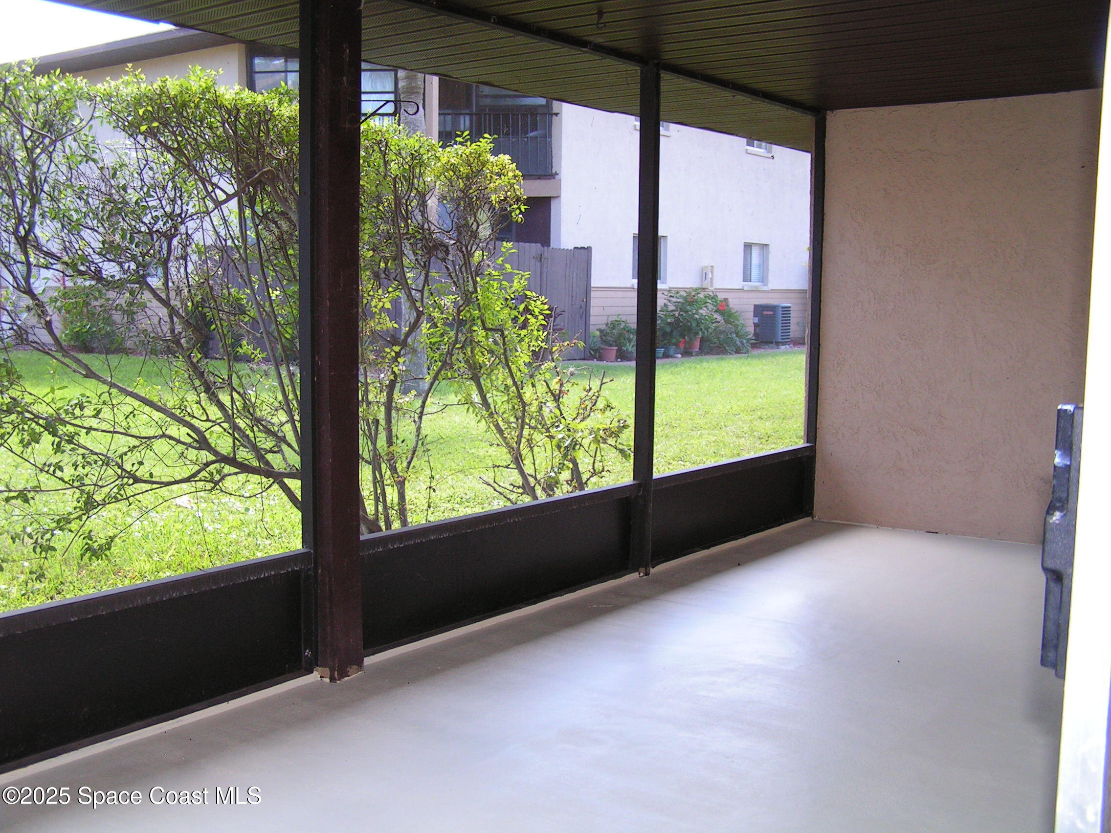 935 Prosperity Place, Unit 803 Rockledge, FL 32955 - Photo 16 of 17 a view of an outdoor view from a balcony