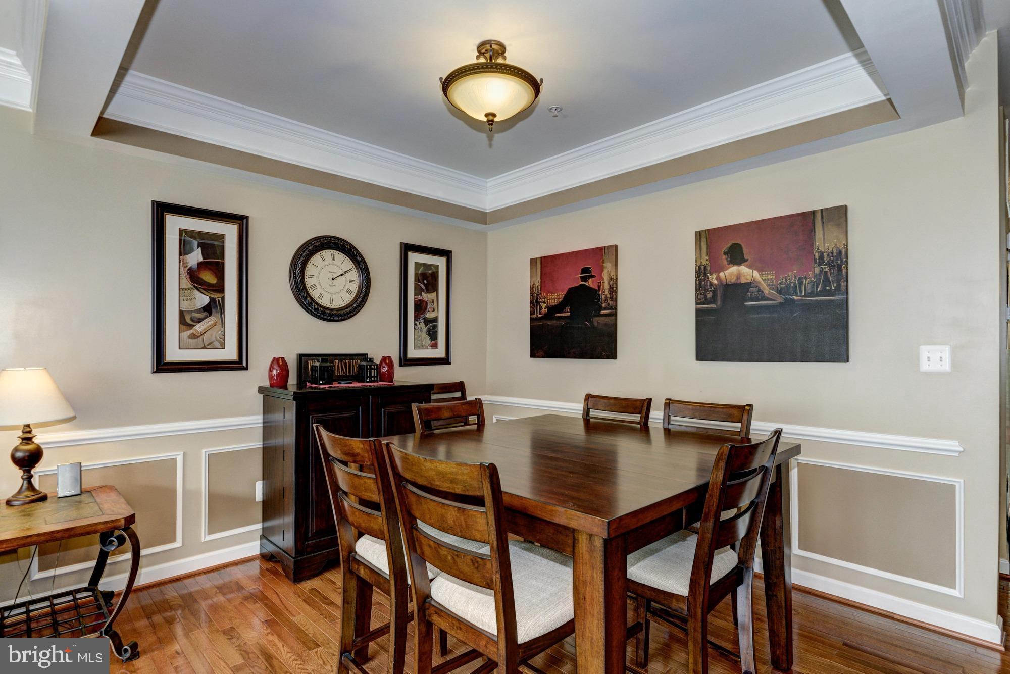 2312 Abby Road Edgewater, MD 21037 - Photo 5 of 38 Dining area with tray ceiling & wainscotting