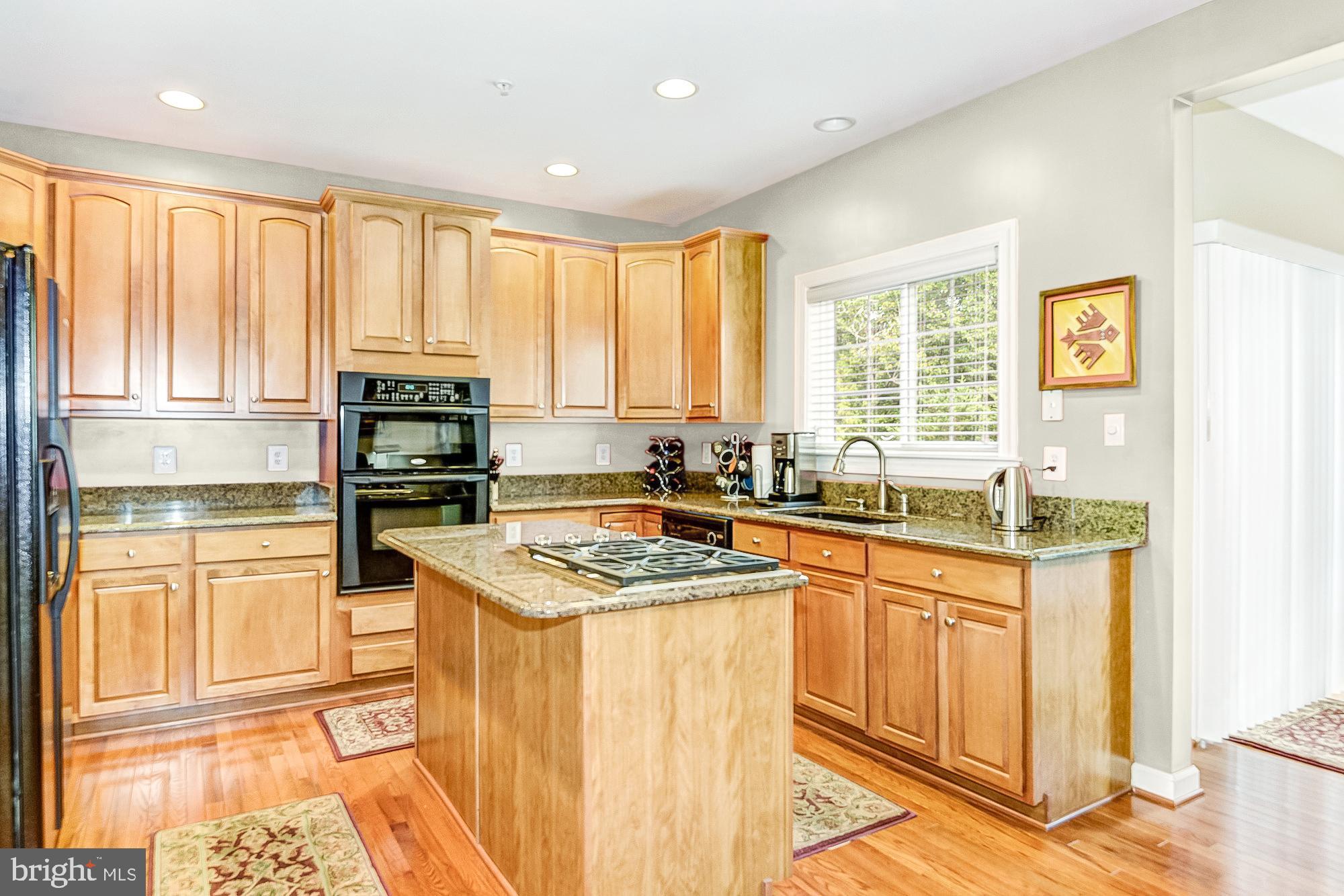2312 Abby Road Edgewater, MD 21037 - Photo 8 of 38 Upgraded cabinets, granite counters, Wolf cooktop