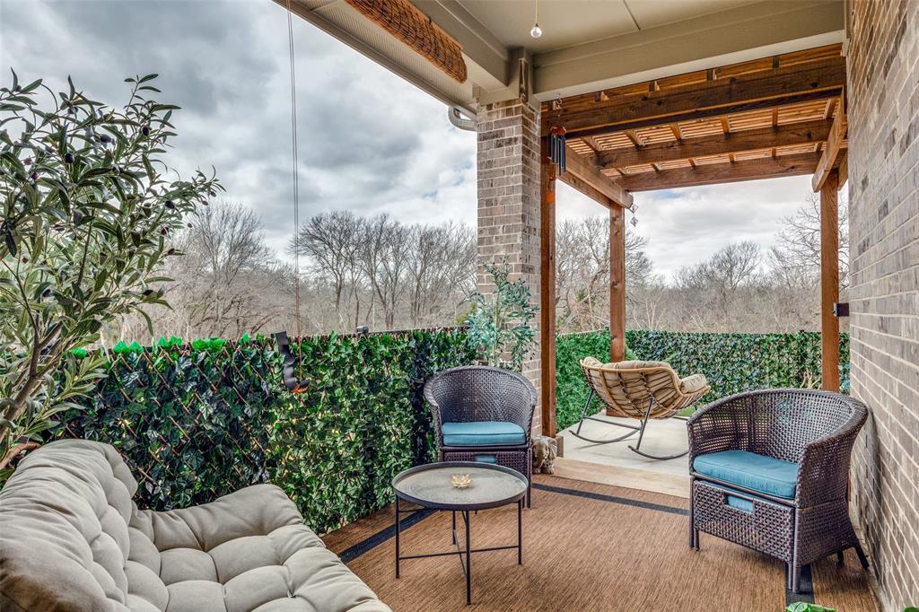 12420 Audubon Trail Rowlett, TX 75098 - Photo 22 of 27 Patio with Greenery added to Existing Wrought Iron Fencing