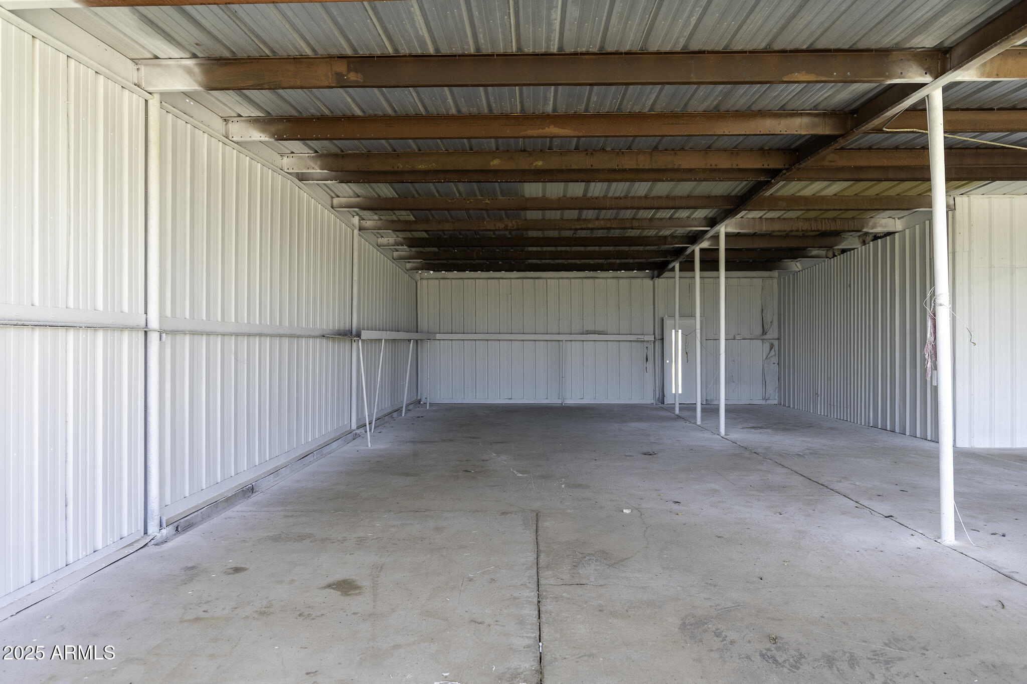 330 North Warren Road, Unit 50161001G Maricopa, AZ 85139 - Photo 14 of 39 a view of empty room with white walls