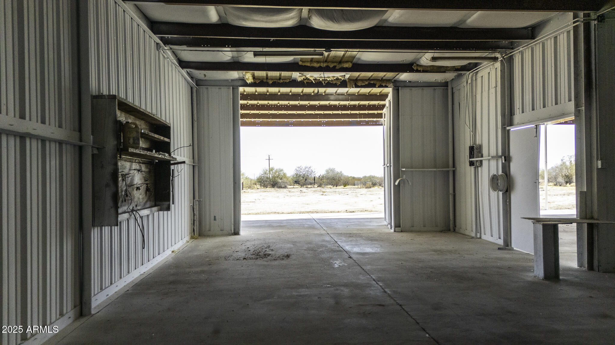 330 North Warren Road, Unit 50161001G Maricopa, AZ 85139 - Photo 17 of 39 a view of hallway with wooden floor and a fireplace