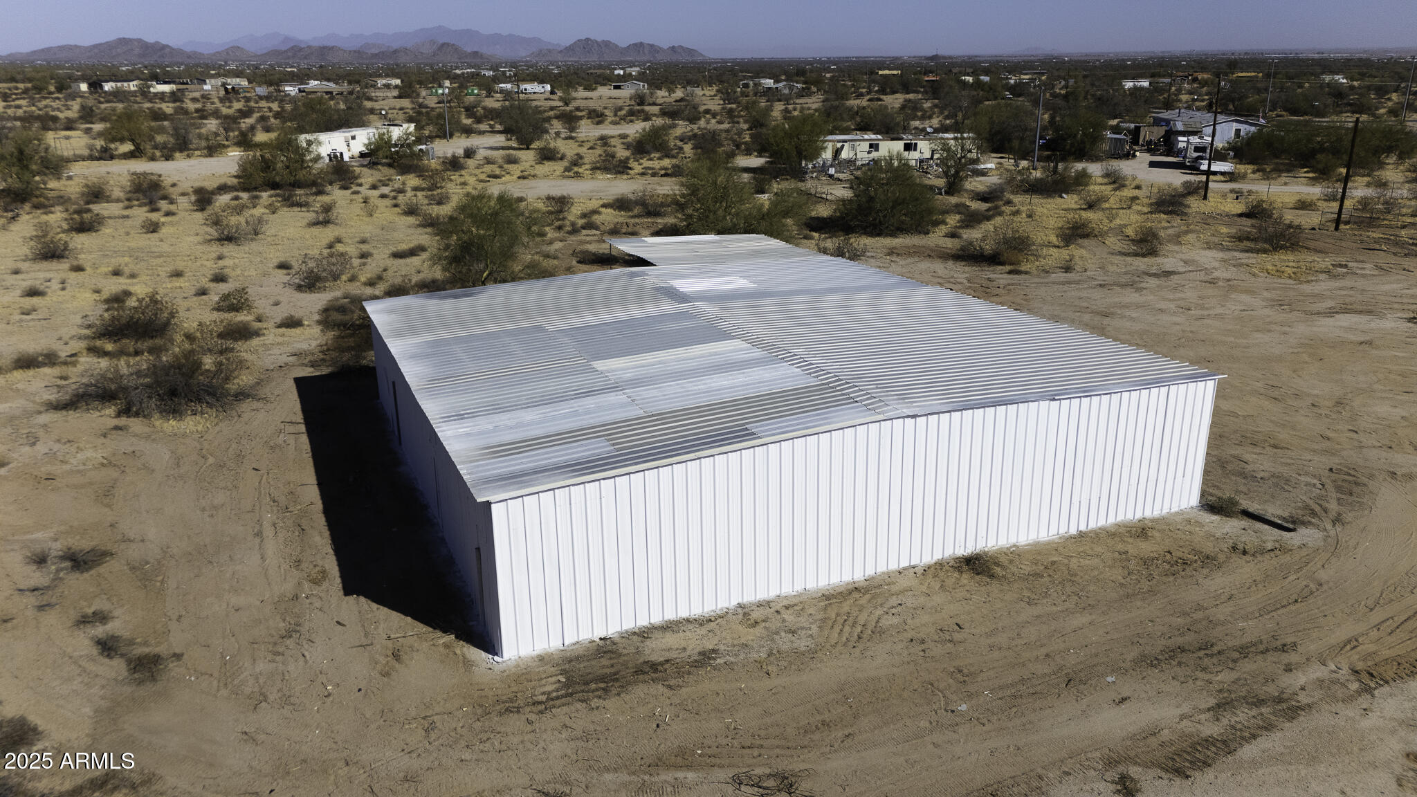 330 North Warren Road, Unit 50161001G Maricopa, AZ 85139 - Photo 23 of 39 an aerial view of a house