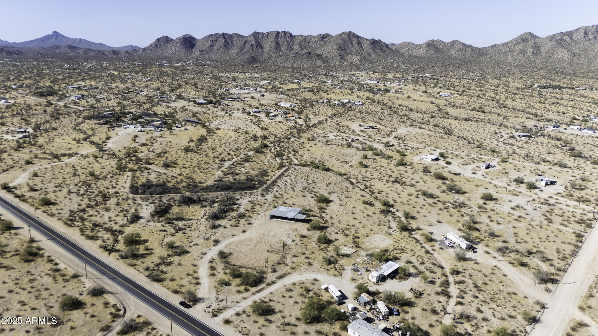 330 North Warren Road, Unit 50161001G Maricopa, AZ 85139 - Photo 30 of 39 a view of a forest with a mountain
