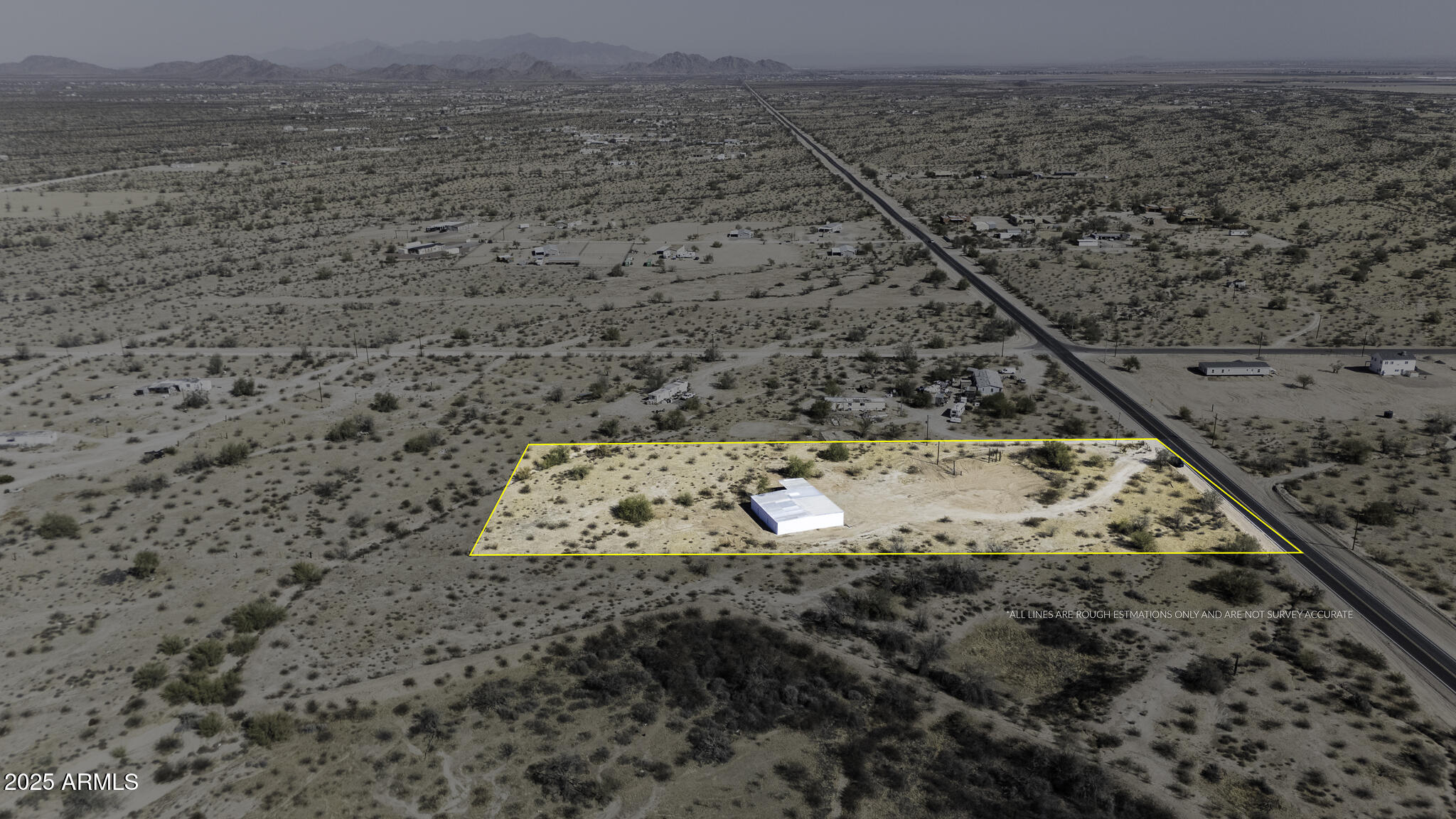 330 North Warren Road, Unit 50161001G Maricopa, AZ 85139 - Photo 35 of 39 a view of roof with wooden floor