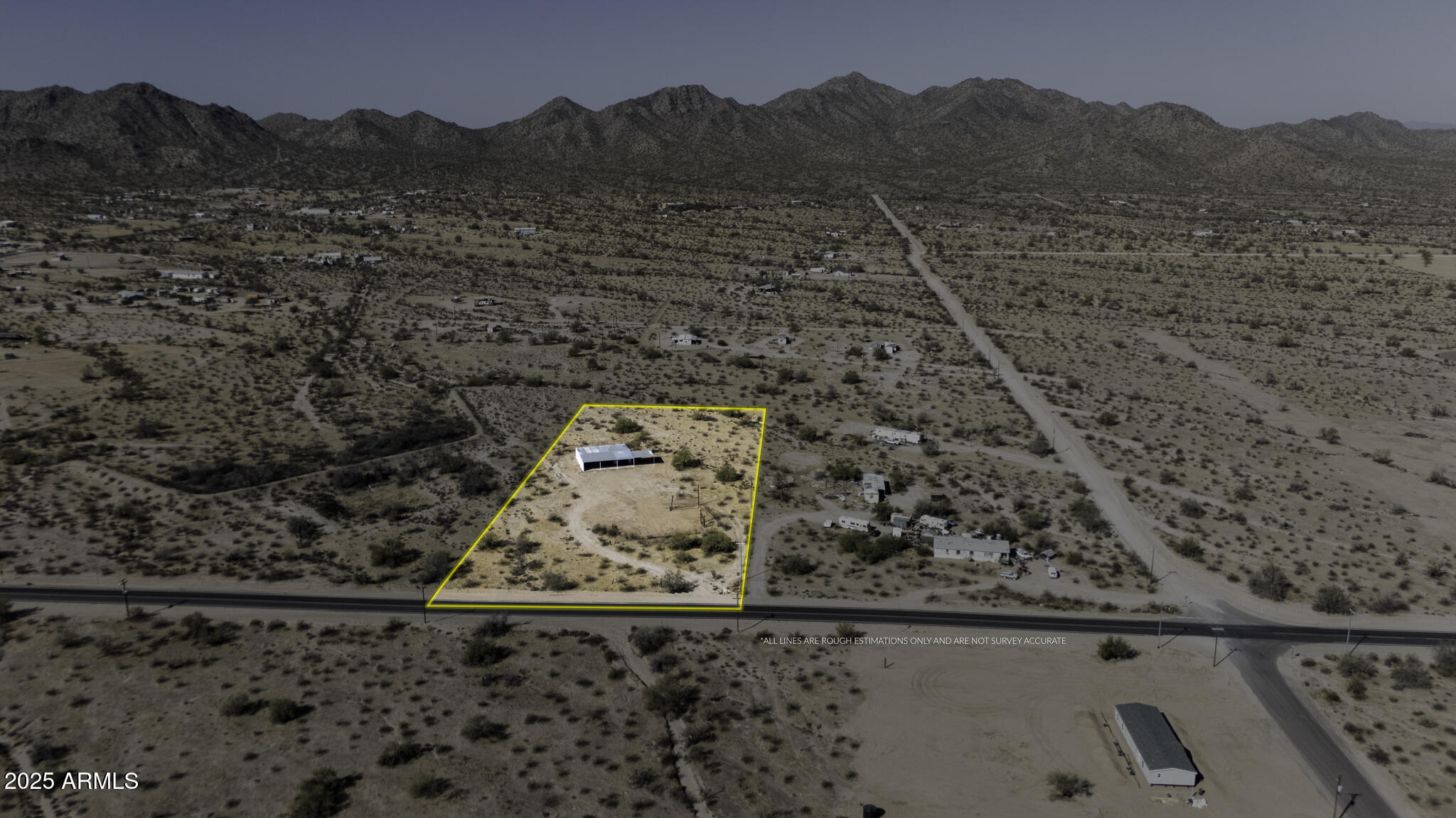 330 North Warren Road, Unit 50161001G Maricopa, AZ 85139 - Photo 10 of 39 a view of a backyard