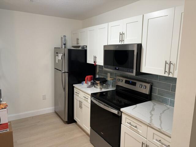 1155 Main Street, Unit 209 Jupiter, FL 33458 - Photo 3 of 9 Kitchen