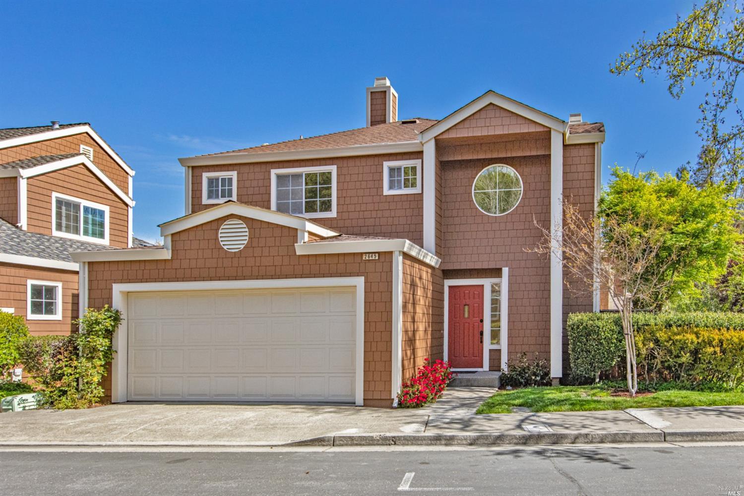 2645 Spring Oaks Drive Santa Rosa, CA 95405 - Photo 1 of 1 a front view of a house with a garden