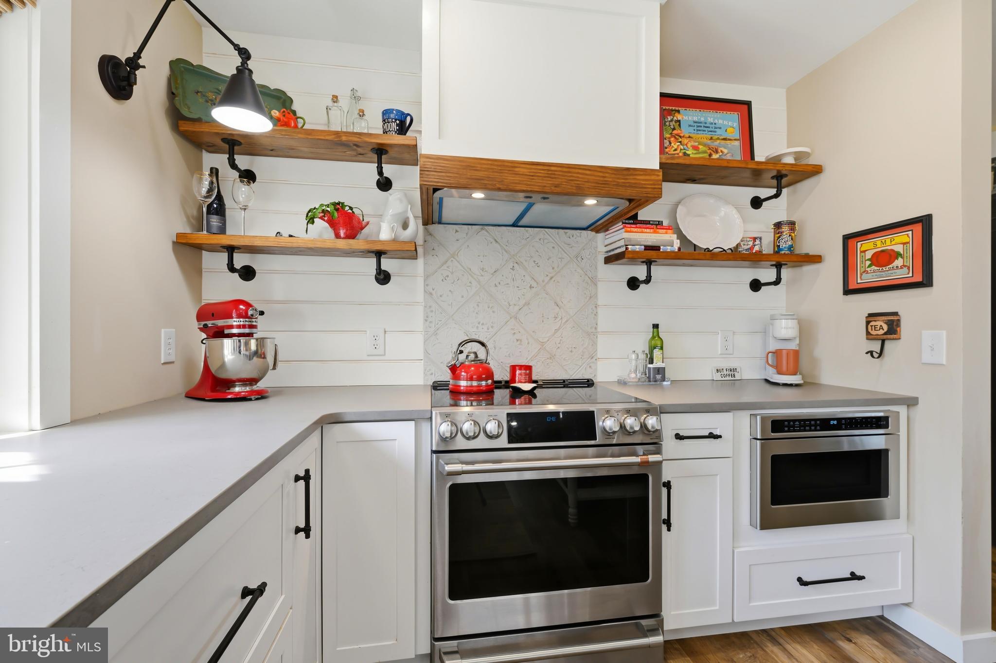 28567 Holden Road Easton, MD 21601 - Photo 22 of 45 a kitchen with a stove and cabinets