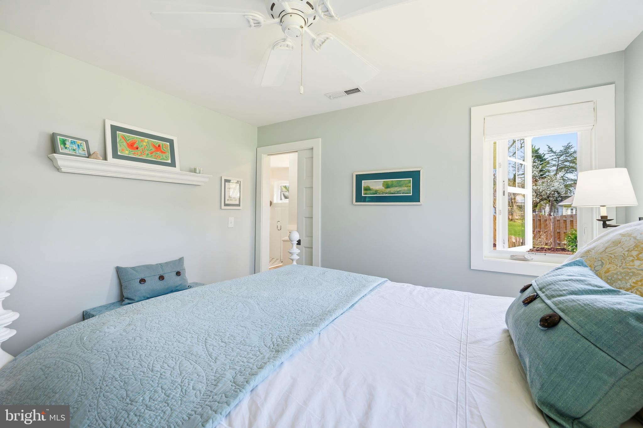 28567 Holden Road Easton, MD 21601 - Photo 38 of 45 a bedroom with a bed and a window