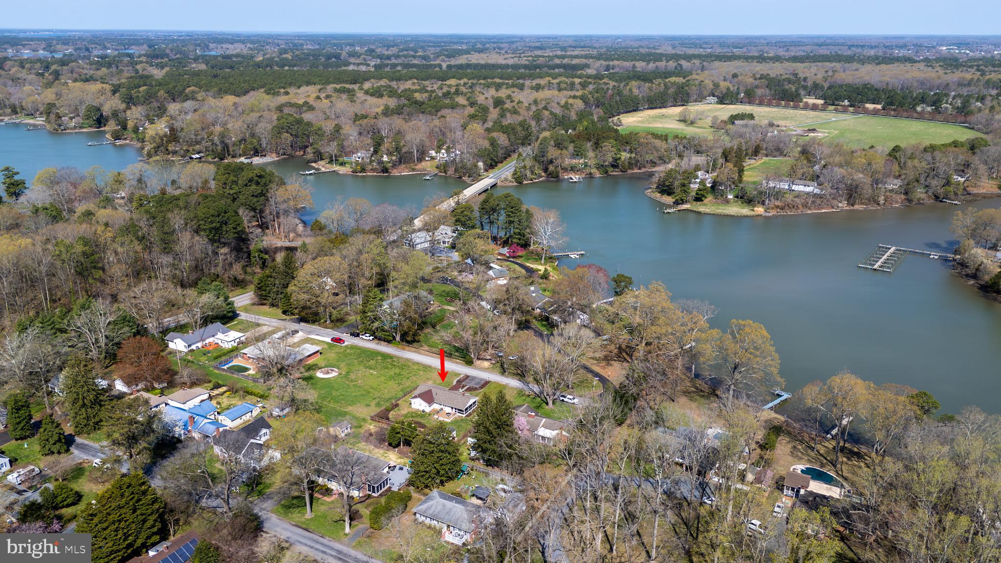 28567 Holden Road Easton, MD 21601 - Photo 43 of 45 an aerial view of lake and residential houses with outdoor space