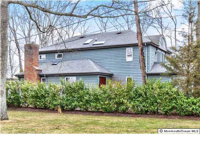 2403 River Road Point Pleasant, NJ 08742 - Photo 1 of 25 a view of a house with a yard