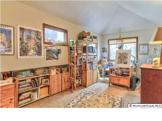 2403 River Road Point Pleasant, NJ 08742 - Photo 17 of 25 a living room filled with furniture and window