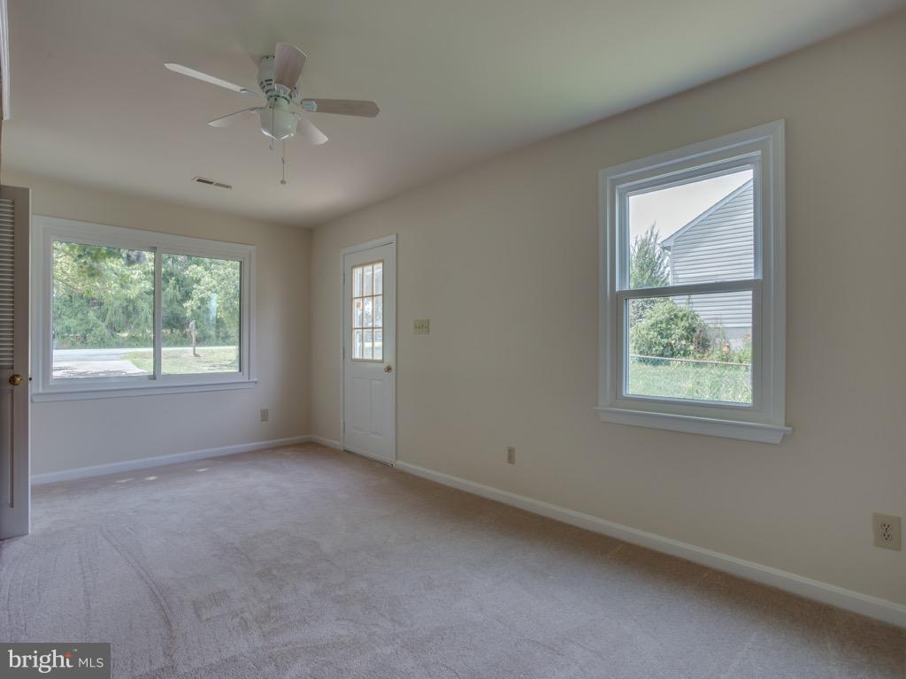 117 Choptank Road Stafford, VA 22556 - Photo 13 of 30 Family Room w/Side Exterior Door & Ceiling Fan