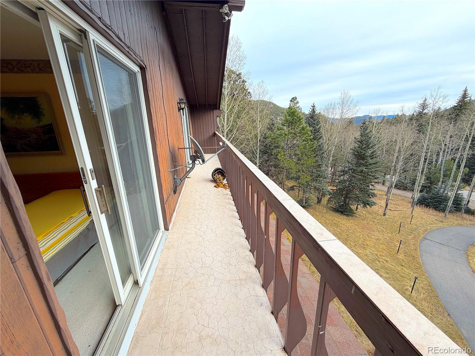 2508 Witter Gulch Road Evergreen, CO 80439 - Photo 19 of 47 a view of balcony