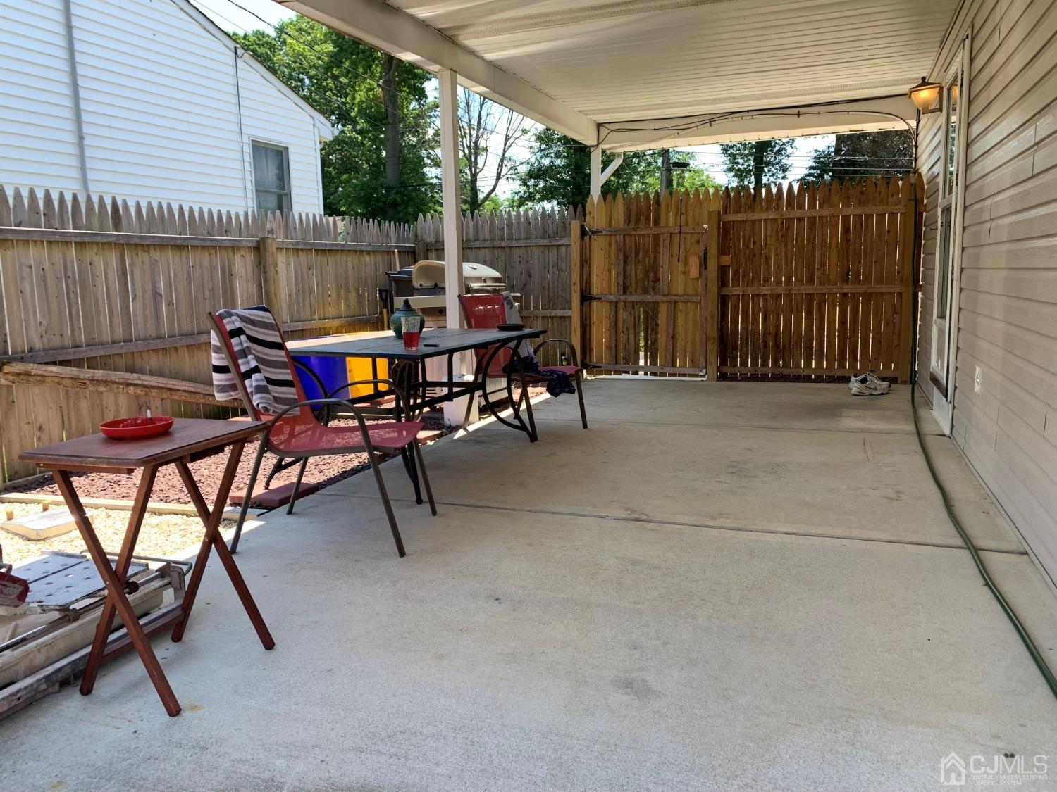 19 Columbia Road Old Bridge, NJ 08859 - Photo 21 of 24 a view of a patio with table and chairs