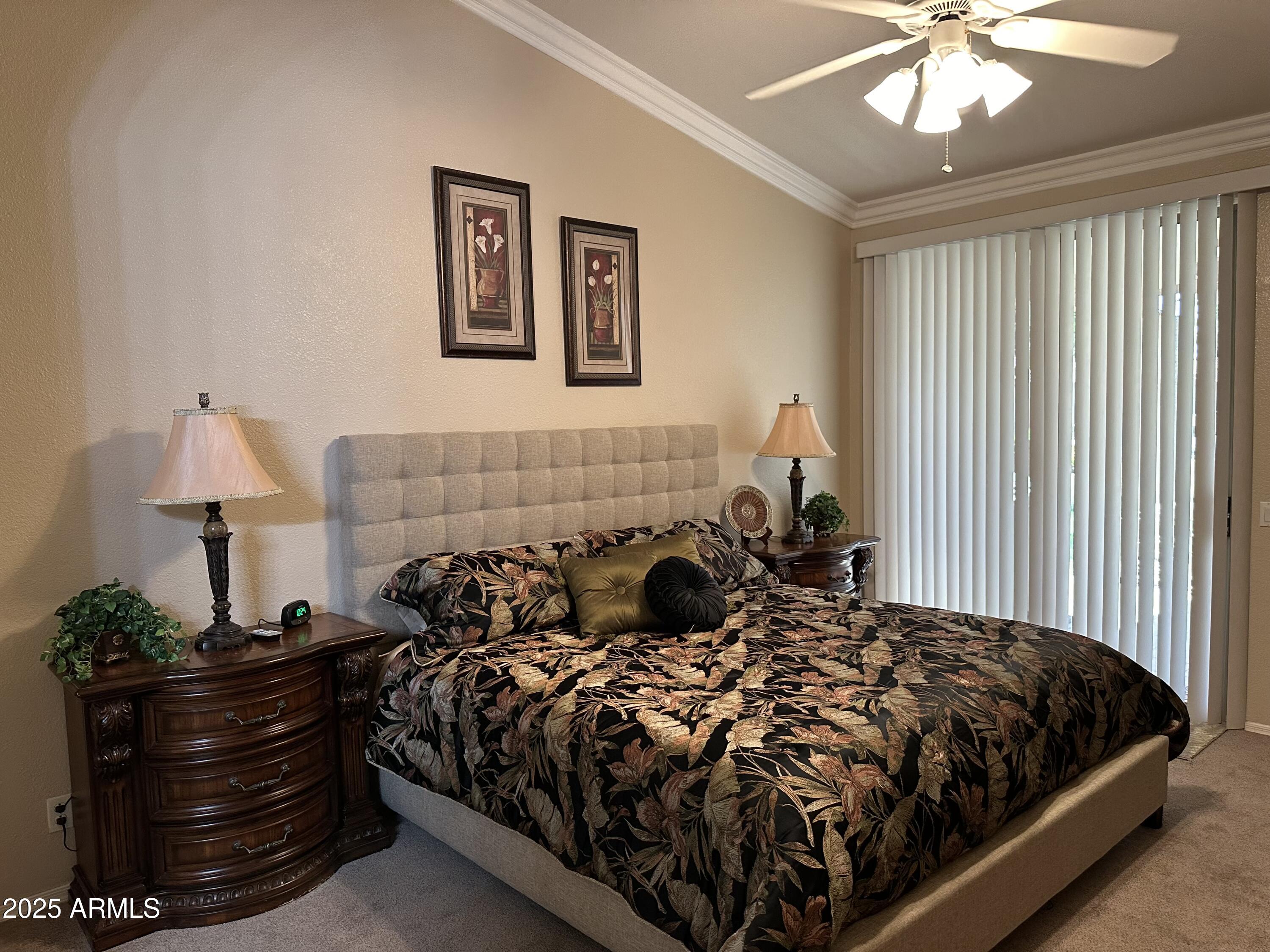 9757 East Tranquility Way Sun Lakes, AZ 85248 - Photo 5 of 10 a bed sitting in a bedroom and night stand