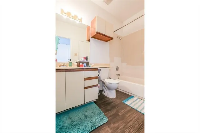 a very nice looking room with a sink and a mirror