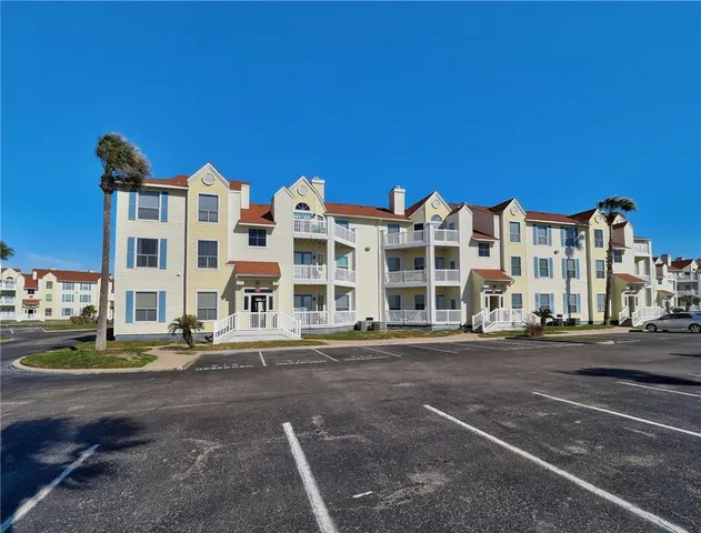 a front view of a building with street view